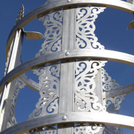 Tulga Public Sculpture - detail (2009) (Ulaanbaatar Park, Denver, CO), stainless steel with cement engraved base, 20 ft x 7'6"