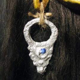 Guuger - detail, acrylic on paper maché, hand beaded ornaments, horsehair, 14"x16"x4"