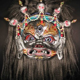Mahakala (silver), acrylic on paper maché, hand beaded ornaments, horsehair, 14"x16"x4"