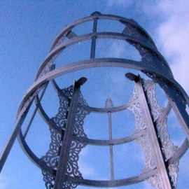 Tulga Public Sculpture - detail (2009) (Ulaanbaatar Park, Denver, CO), stainless steel with cement engraved base, 20 ft x 7'6"