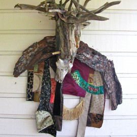 Lord of Divinity (2010), tree bark, tree root, fabric installation, sheep skull, fabric transfer, 34”x55”x17”